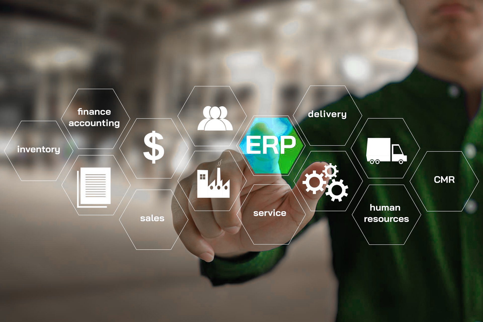 Man pressing the ERP button and other systems surround it to emphasize ERP data integration with other applications